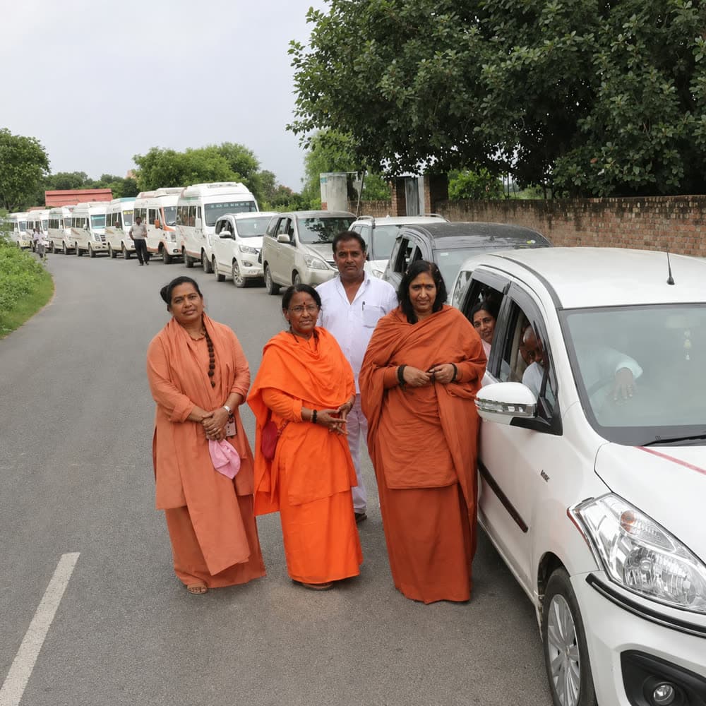 Yatra convoy of vehicles setting off in Braj